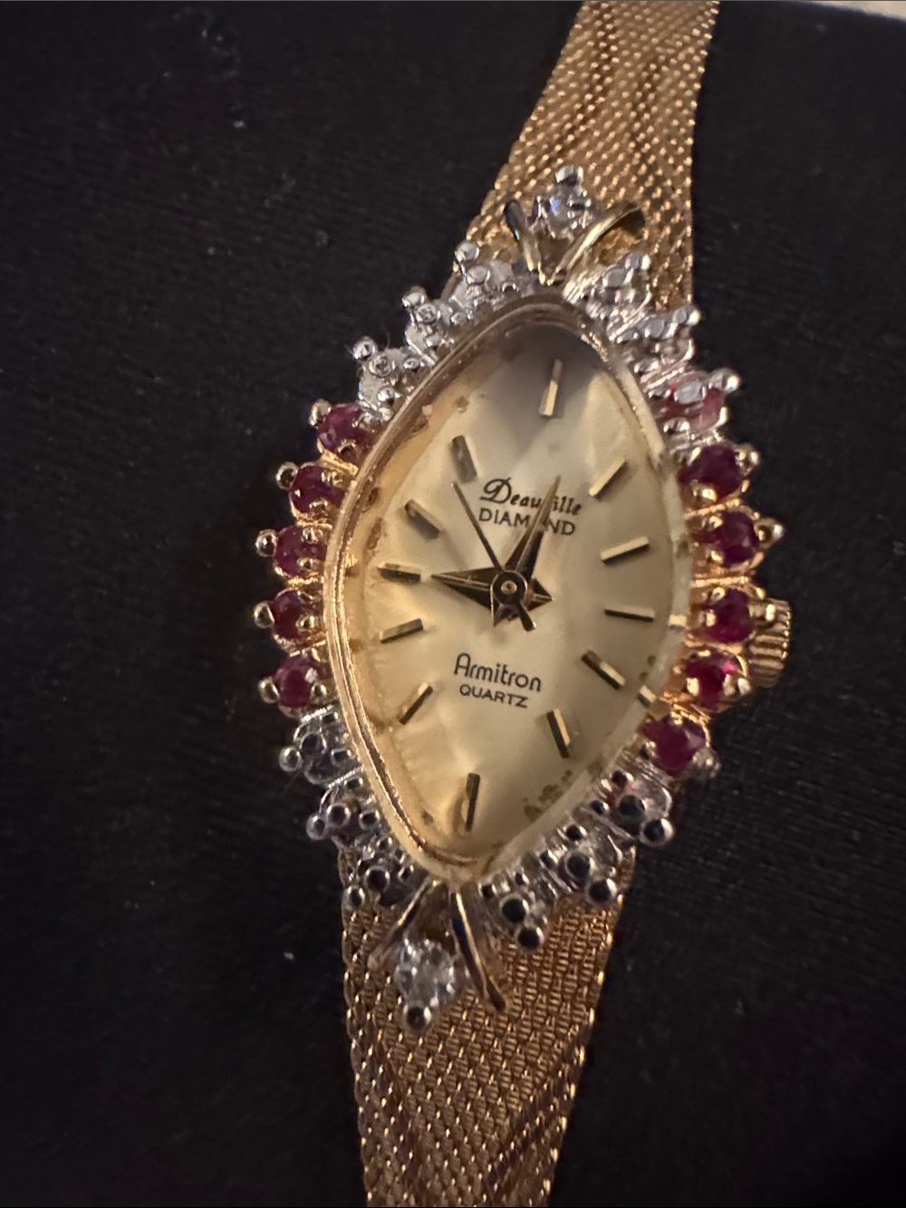 Deauville Armitron quartz Gold-Tone Ladies Watch with Red Stone Halo and Clear